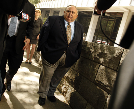 Robert Rizzo leaves the L.A. courthouse where he was sentenced with orders to report to prison the next month.