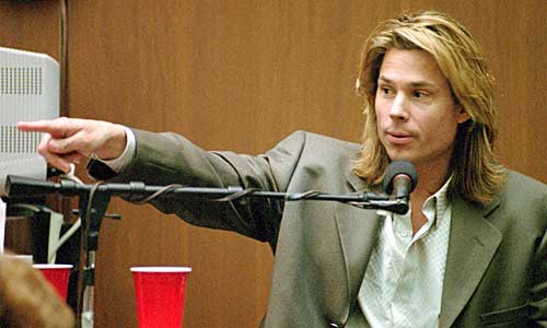 Brian "Kato" Kaelin points to double-murder defendant O.J. Simpson during testimony.
