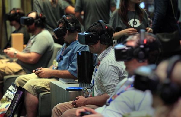 Attendees try out the Oculus Rift 2 during E3 2014.