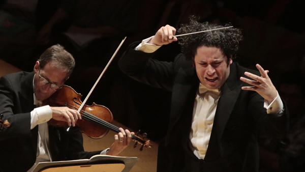 L.A. Philharmonic music director Gustavo Dudamel conducts the orchestra during a performance at Walt Disney Concert Hall on Oct. 2, 2014. 