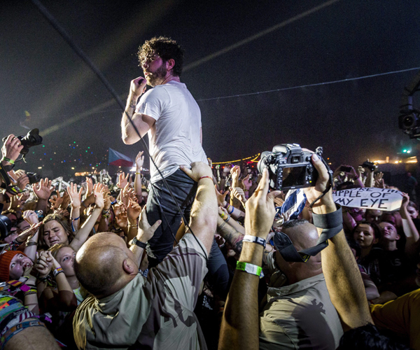 Singer and guitarist Yannis Philippakis of Foals mid concert.