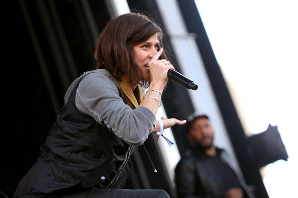 Dessa onstage with Doomtree in September 2015.