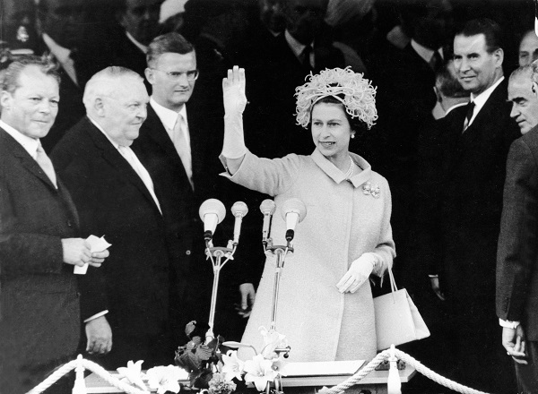 Queen Elizabeth II on the balcony of the Rathaus Schoneberg, the West Berlin city hall, in 1965. 