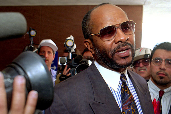 King's attorney, Milton Grimes, talks to reporters after announcement of jury award.