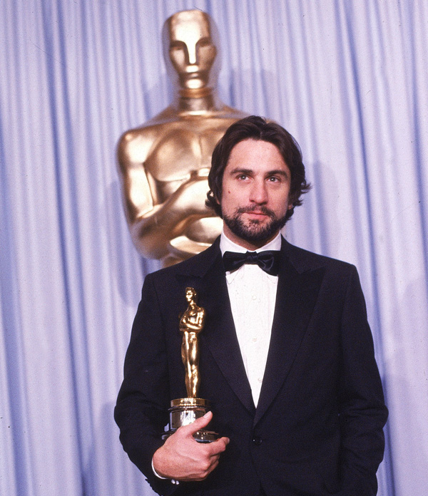Robert De Niro holds his best actor Oscar for "Raging Bull."