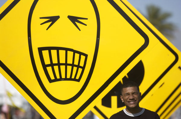 At Coachella 2003, a fan mimics an artwork.