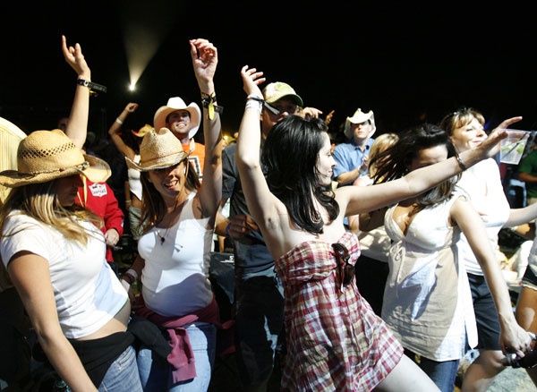 The first Stagecoach crowd parties down.